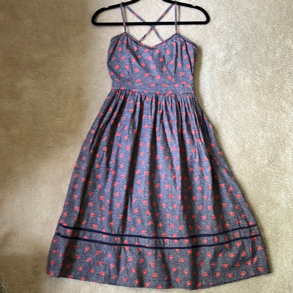 Women’s sun dress. Navy print with red. Adjustable straps, 100% cotton.
